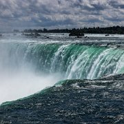 2022-07-25_130579_WTA_R5 Niagara Falls (/naɪˈæɡərə/) is a group of three waterfalls at the southern end of Niagara Gorge, spanning the border between the province of Ontario in Canada...