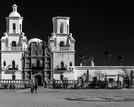 2018-03-23_32196_WTA_5DM4 - Panorama - 6 Images - 16228x6455_0000 Mission San Xavier del Bac is a historic Spanish Catholic mission located about 10 miles (16 km) south of downtown Tucson, Arizona, on the Tohono O'odham San...