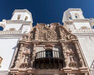 2018-03-23_32242_WTA_5DM4-2 Mission San Xavier del Bac is a historic Spanish Catholic mission located about 10 miles (16 km) south of downtown Tucson, Arizona, on the Tohono O'odham San...