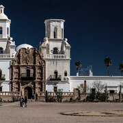 2018-03-23_32196_WTA_5DM4 - Panorama - 6 Images - 16228x6455_0000-2 Mission San Xavier del Bac is a historic Spanish Catholic mission located about 10 miles (16 km) south of downtown Tucson, Arizona, on the Tohono O'odham San...