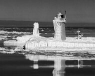 2026-02-01_303650_WTA_Mavic_4_6x The South Haven Lighthouse, marking the entrance to the Black River on Lake Michigan, has guided vessels since 1872, when the first wooden pier lights were...
